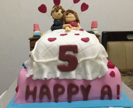 Fondant anniversary themed cake