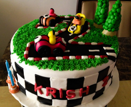 Fondant racing track themed cake