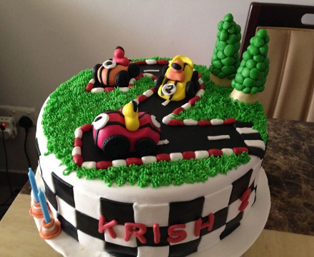 Fondant car race themed cake