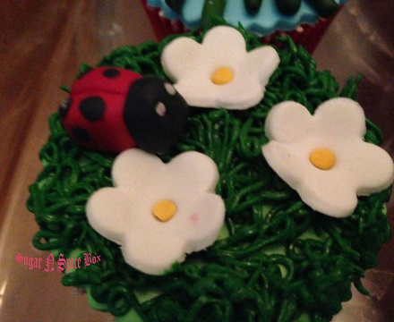 Fondant white flower cupcake